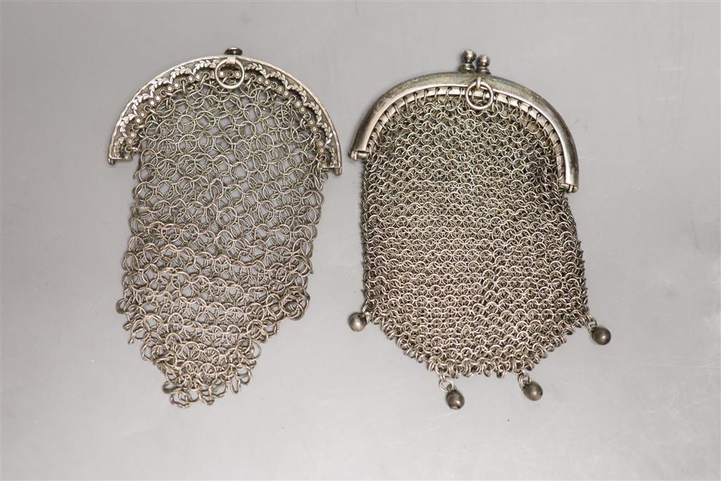 A George III silver chain link purse, John Shaw, Birmingham, 1810, 10cm and one other white metal purse.